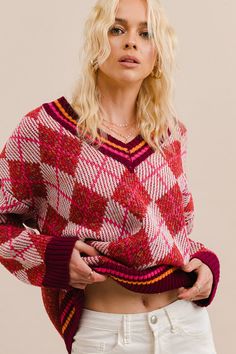 -Color: Rose -V-neck loose fit argyle pullover knit sweater -Multi color -V-neck -Long sleeves -Ribbed on neck, cuffs and hem -Content: 100% Acrylic -Imported -Model is 5' 10" 31-25-35 and wearing a size Small Winter V-neck Argyle Pattern Top, V-neck Top With Argyle Pattern For Fall, Fall V-neck Top With Argyle Pattern, Fall Argyle V-neck Top, Knitted Pullover Sweaters, Modern Fashion, V Neck Sweater, Vneck Sweater, Knit Sweater