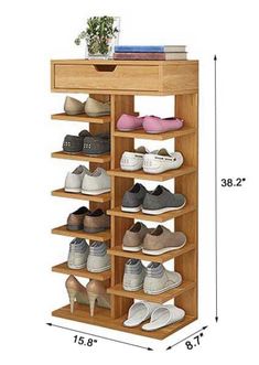 a wooden shoe rack with several pairs of shoes on it and measurements for each shelf