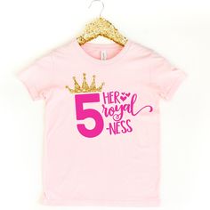 a pink t - shirt with the number five and a crown on it that says her royal