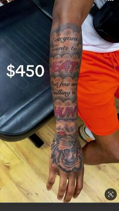 a man's arm with tattoos on it and the words $ 450 written below