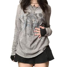 PRICES MAY VARY. Material: Women’s fairy grunge t-shirt is made of high quality polyester fabric it’s skin-friendly, stretchy, breathable, comfortable to wear and quick dry. Feature: Long sleeve loose pullover, graphic print punk top for teen girls, fashionable round neck e-girl dailywear. Occasion: The stylish grunge sweatshirt suitable for party, nightclub, shopping, dating, travel, vacation, dating, yoga, sport, indoor and outdoor, it also can be a gift to your friend and families on valentin Gothic Hoodies, Grunge Sweatshirt, 2000s Clothing, Casual Halloween, Grunge Shirt, Y2k Long Sleeve, Estilo Grunge, Aesthetic T Shirts, Fitted Blouses