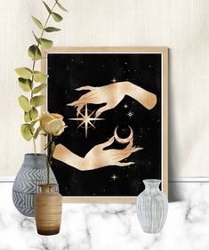 two hands touching each other over a star in the night sky above vases with flowers