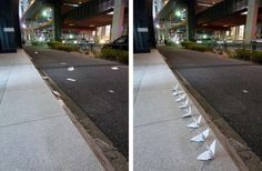 two pictures of white paper airplanes on the ground in front of a building at night