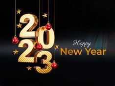 a happy new year greeting card with gold numbers and ornaments hanging from strings on a black background