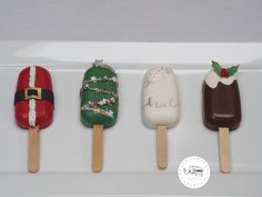 four pops decorated like santa hats and candy canes