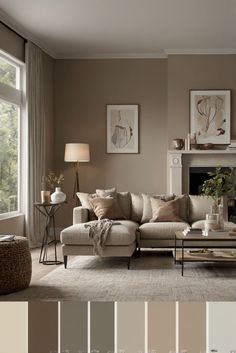 a living room filled with furniture next to a fire place in front of a window