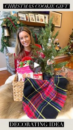 a woman sitting in front of a christmas tree with presents on it and the words decorating idea