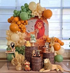 the lion king birthday party with balloons and decorations