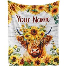 a cow with sunflowers on it's head and the words, your name