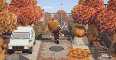 an animated image of a person walking down a path with pumpkins on the ground