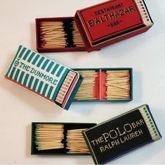 three matchboxes that have matches in them