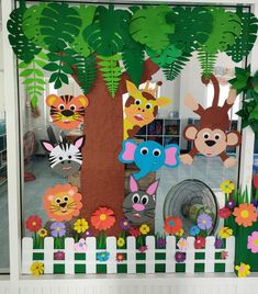 an animal themed classroom display with paper cutouts