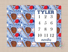 a calendar with baseballs and bats on blue paper, including the date for each month