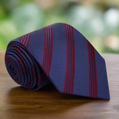 A Blue Striped Standard Tie For Formal Occasions, Classic Striped Standard Tie, Pinstripe Business Tie, Business Pinstripe Standard Tie, Pinstripe Ties For Formal Occasions, Striped Business Neckwear Ties, Striped Business Neckwear, Navy Office Tie, Charcoal Gray Suit