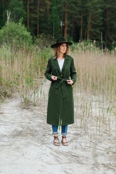 "Arizona coat, Long linen coat, Green linen coat, Autumn linen coat, Handmade linen coat, Classic linen coat, Coat with belt, Minimalist coat -----------We do make custom made clothes. Just let us know your measurements ------------------- * Name: Arizona coat * Handmade * Colour: FOREST * 100 % washed & softened Lithuanian linen * 205 g/m2 * With cotton lining * With belt * Two buttons * Inner pockets * Length of the coat - 120 cm * Length of the sleeves - 62 cm The model is 178 cm height a Spring Linen Belted Outerwear, Fall Linen Belted Outerwear, Belted Linen Outerwear For Fall, Belted Linen Long Sleeve Outerwear, Belted Long Sleeve Linen Outerwear, Long Sleeve Belted Linen Outerwear, Long Linen Outerwear For Winter, Bare Shoulder Dress, Coat Classic