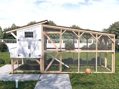 a chicken coop in the middle of a grassy area with a walkway leading to it