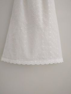 "An exquisite accessory for your wardrobe, this feminine underskirt worn with your skirt or dress will make you feel very special ! This skirt is made of a nice 100% white cotton eyelet fabric with elastic waistband. Straight silhouette, gathered with elastic at the waist. This white ruffly underskirt is perfect for so many beautiful outfits. This accessory makes a perfect gift! * Sizing* This skirt can be made to your length and waist specifications. The skirt length shown is 30\". However it c Fitted Broderie Anglaise Skirt, Fitted White Petticoat For Summer, White Summer Skirt Petticoat, White Summer Petticoat Skirt, Summer White Skirt Petticoat, Elegant Summer Petticoat With Lace Trim, Elegant Broderie Anglaise Summer Skirt, Summer Wedding Lace Petticoat, White Sleeveless Petticoat For Spring