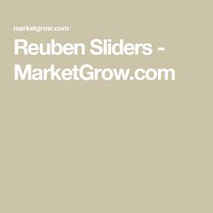 the words reuben slidesr - marketgrow com are in white letters