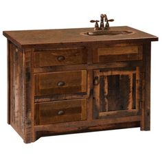 an old wooden sink cabinet with two drawers and a faucet on the top