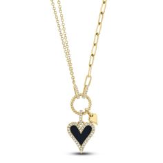 Sassy and stylish, this black onyx and diamond heart necklace from Shy Creation® is look you'll love to wear. 14K yellow gold Round diamonds halo the heart-shaped natural black onyx gemstone pendant, which is paired with a miniature polished heart pendant More round diamonds adorn the bail and chain connectors A rope-twist loop completes the glamorous style Total diamond weight is 1/8 carat 18-inch double rolo and paperclip link chain; lobster clasp Statement Heart Necklace, Ring Goals, Lucky 7, Jared The Galleria Of Jewelry, Best Gifts For Mom, Rope Twist, Heart Necklace Diamond, Jewelry Accessories Ideas, Glamorous Style