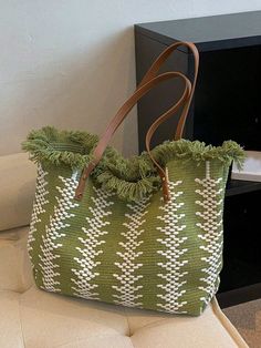 Elevate your beach day style with our Summer Chic Straw Fringed Tote Bag. Made from high-quality straw and featuring playful fringe details, this tote is both fashionable and functional. Perfect for storing your beach essentials, this bag is a must-have for any summer adventure. Color : Green Strap Type : Double Handle Details : Fringe Bag Size : Large Style : Vacation Type : Shoulder Tote Bag Closure Type : Buckle Pattern Type : Colorblock Features : High-capacity Material : Polyester Composition : 100% Polyester Bag Height Bag Length Bag Width 33 43 15 Trendy Fringe Shoulder Bag For Spring, Casual Fringe Beach Bag For Daily Use, Trendy Spring Bags With Tassels, Chic Summer Bags With Fringe, Trendy Woven Beach Bag For Shopping, Daily Use Fringe Tote Beach Bag, Casual Fringed Beach Bag, Trendy Tassels Bag For Spring, Casual Spring Bags With Fringe