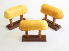 three pieces of bread sitting on top of each other in front of a white background