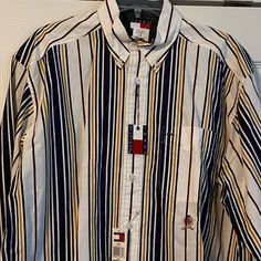 Vintage 90s Nwt Tommy Hilfiger Striped Long Sleeve Button Up - Medium Nwt Vintage Medium 100% Cotton Let Me Know If You Have Any Questions. Tommy Hilfiger Button-up Tops, 90s Style Long Sleeve Shirt With Button Closure, Classic Tommy Hilfiger Striped Tops, Tommy Hilfiger Button-up Shirt For Spring, Tommy Hilfiger Casual Button-up Shirt, Casual Tommy Hilfiger Tops With Buttons, Tommy Hilfiger Collared Top With Button Closure, Tommy Hilfiger Casual Shirt With Buttons, Tommy Hilfiger Long Sleeve