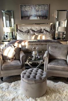 grey sofa chair, grey bd, grey round ottoman, white fluffy rug, grey bedding, silver mirrored bedside table, wall mirrors, white lamp Grey Bedroom Set Decor Ideas, Lux Bedroom, Bedroom Ideas Elegant, Bling Bedroom, White Fluffy Rug, Bedroom Schemes, Grey Bedroom Set, Mirror Bedside, Ottoman White