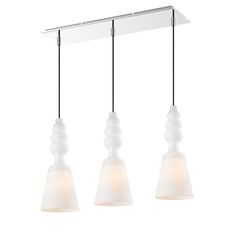 three lights hanging from a ceiling fixture