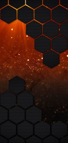 an orange and black background with hexagons in the foreground, light shining from above