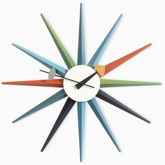 a multicolored clock is shown on a white background