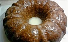 a chocolate bundt cake sitting on top of a counter