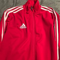 Never Been Worn. Like Brand New University Red Winter Sports Outerwear, Sporty University Red Outerwear For Fall, Red Spring Track Jacket For Sports, Red Sporty Track Jacket For Winter, Red Sporty Winter Track Jacket, Sporty Red Track Jacket For Winter, Red Outerwear For Sports In Fall, Adidas Casual Red Track Jacket, Adidas Red Track Jacket For Streetwear