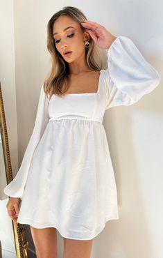 Straight out of a fairytale in our Marianna Mini! This whimsical, long sleeved dress is flowy and comfortable. Wear with delicate heels and jewelry for a beautiful bridal 'fit! Flowy Dress Short Long Sleeve, Short Dress Long Sleeve White, Longsleeve Dresses Short, White Long Sleeve Dresses Short, Long Sleev Short Dress, Bridal Shower Dress For Bride Puff Sleeve, Flowy Mini Dress Long Sleeve, White Cocktail Dress Flowy, Long Sleeved Dress Short