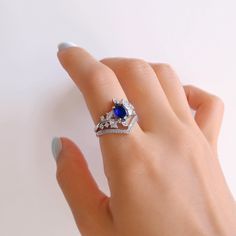 Introducing our new Bella ring. Featuring your choice of natural crystals and a beautiful deep blue sapphire. ✦ DETAILS ✦ ✧ Handcrafted  ✧ 1.25 Carat center stone ✧ Sapphire and natural crystals  ✧ Sizes 3.75-14.25 ✧ Sterling Silver 925 ✧ This ring will arrive ready to gift in a Kherish Jewelry Pouch. ✧ PRE-ORDER: Items that are preorder only will ship within 10-15 business days.  You will receive an email with the updated processing time if you order a size/option that qualifies for pre-order. Ring For Women Unique, Leaf Engagement Ring, Anniversary Gift For Her, Sapphire Diamond, Ring For Women, Womens Engagement Rings, Jewelry Pouch, Promise Ring, Natural Crystals