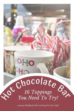 hot chocolate bar with candy canes and peppermints in the background text reads, hot chocolate bar 16 toppings you need to try