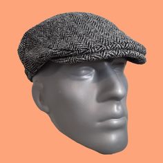 Embrace Timeless Style With This Luxurious Genuine Harris Tweed Cap, Hand Finished In Maryland, Usa. Harris Tweed Is Crafted From Premium Wool, Handwoven In The Outer Hebrides Of Scotland In The Homes Of Local Islanders. Look For The Orb Mark - It's Your Guarantee Of Authenticity. This Striking Cap Has A Soft Satin Lining For Ultimate Comfort. We Offer Only The Finest Quality Tweed, Harris Tweed And Waxed Cotton Hats & Accessories, Bringing A Touch Of British Heritage To Your Wardrobe. - 100% Ge Classic Black Hat With Herringbone Pattern, Black Herringbone Pattern Flat Cap, Black Tweed Cap, Black Casual Tweed Hat, Casual Black Tweed Hat, Frontal Bone, Tweed Cap, The Orb, Outer Hebrides