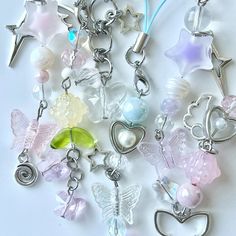 a bunch of charms that are sitting on a table