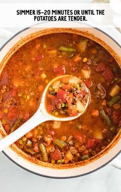 a pot full of soup with a spoon in it and the words summer 15 - 20 minutes or until the potatoes are tender