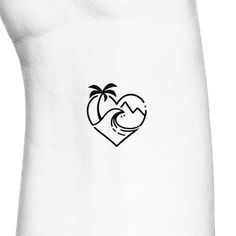 the back of a white shirt with a heart and palm trees on it