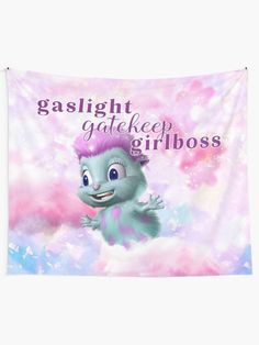 a pink and blue wall hanging tapestry with a cartoon character on it's face