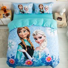 a bed with two frozen princesses on it and one is blue, the other has pink flowers