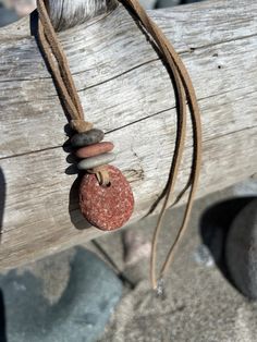 Natural flat pebble necklace -- hangs roughly 15" long -- lobster clasp closure Adjustable Teardrop Necklace With Lobster Clasp, Adjustable Dangle Necklace For The Beach, Adjustable Dangle Necklaces For The Beach, Earthy Adjustable Round Pendant Necklace, Pebble Crafts, Pebble Jewelry, Pebble Pendant, Pebble Necklace, Rock Necklace