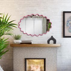 a living room with a fire place, mirror and potted plant on the mantle