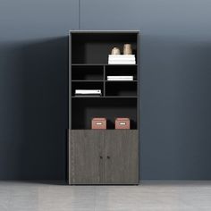 a book shelf with some books on top of it and two boxes in front of it