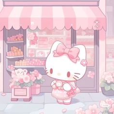 a hello kitty shop with pink flowers and teddy bears