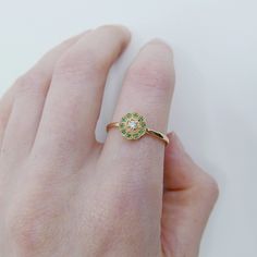 This "Flora" ring has a bit of old world charm to it, the pop of color from the emeralds surrounding the diamond really bring this ring to life. Like your very own bit on mother nature on your finger. This Flora ring is also a great addition to your everyday ring collection, and can be stacked to perfection! Details: 14k Gold (options to choose from: yellow, rose or white) Available in sapphire, ruby, emerald, or diamond options. This ring can come in a half diamond pave band upon request (pleas Rose Gold Emerald Ring, Valentines Gift Ideas, Pave Diamond Band, Everyday Ring, Pave Band, Ruby Emerald, Everyday Rings, Ring Collection, Old World Charm