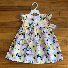 Nwt! Carter’s 2-Piece Floral Dress. Includes Dress And Bloomers. Size 24 Months. Flutter Sleeves. 4 Buttons On Back. Perfect For Easter And Spring! Spring Playwear Dresses With Flutter Sleeves, Flutter Sleeves, Piece Dress, Kids' Dresses, Flutter Sleeve, 2 Piece, Floral Dress, Pink Blue, Colorful Dresses