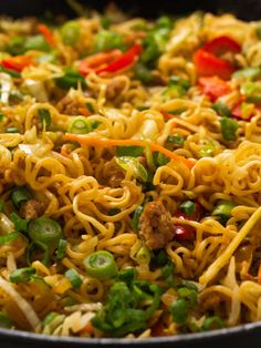 noodles with meat and vegetables in a skillet