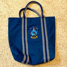 Ravenclaw Bag - From Harry Potter World! Never Used! Offers Welcome. New To Posh? Use Code _simplysteph_ When Signing Up For $10 Off Your First Order! My Etsy Shop: Https://Simplystephsco.Etsy.Com My Photography Prints: Https://Fineartamerica.Com/Profiles/2-Stephanie-Odonnell?Tab=Artwork Alpha Accessories Discount: Stephxo20 For 20% Off Their Jewelry With Your Purchase! Raven Claw, Harry Potter Ravenclaw, Harry Potter World, Ravenclaw, Photography Print, Blue Gold, Kids Accessories, First Order, Gym Bag